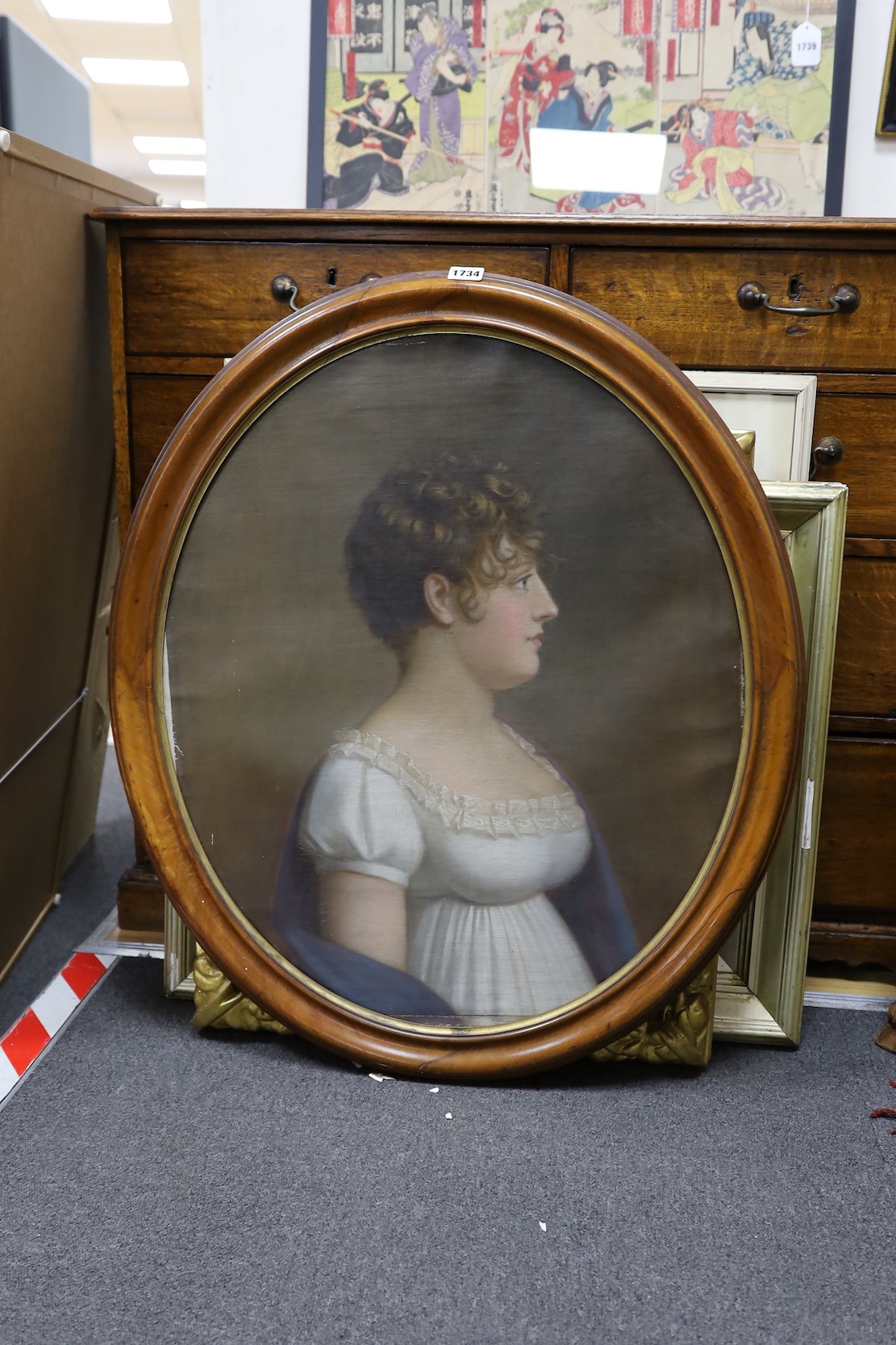 Early 19th century Continental School, oil on canvas, Portrait of a young lady, overall 67 x 56cm
